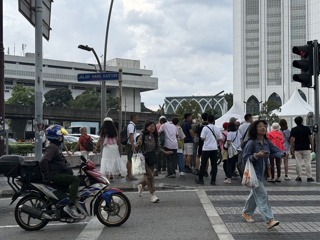 Pedestrians on a central Kuala Lumpur street